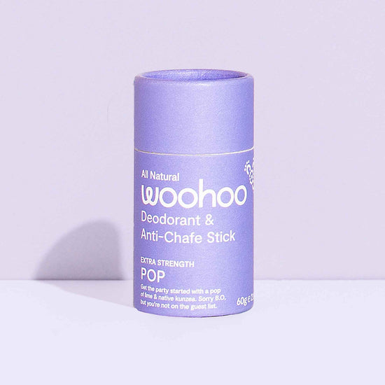 Cardboard tube of Woohoo body all natural vegan and cruelty free deodorant pop. Diminish.