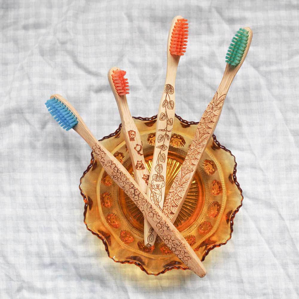 Set of family eco friendly and bamboo handled toothbrushes.