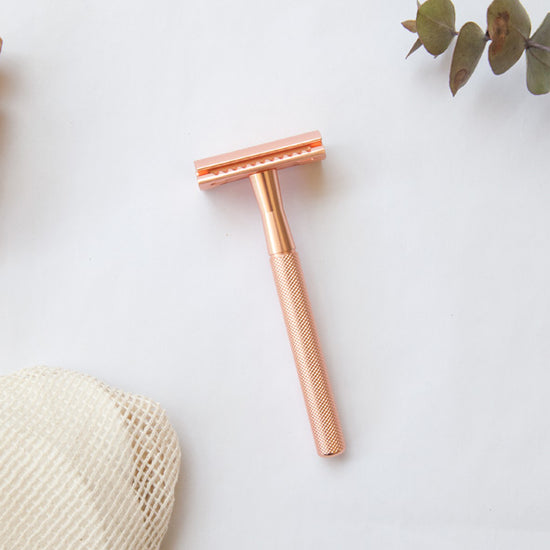 Brush it on rose gold plastic-free reusable razor.