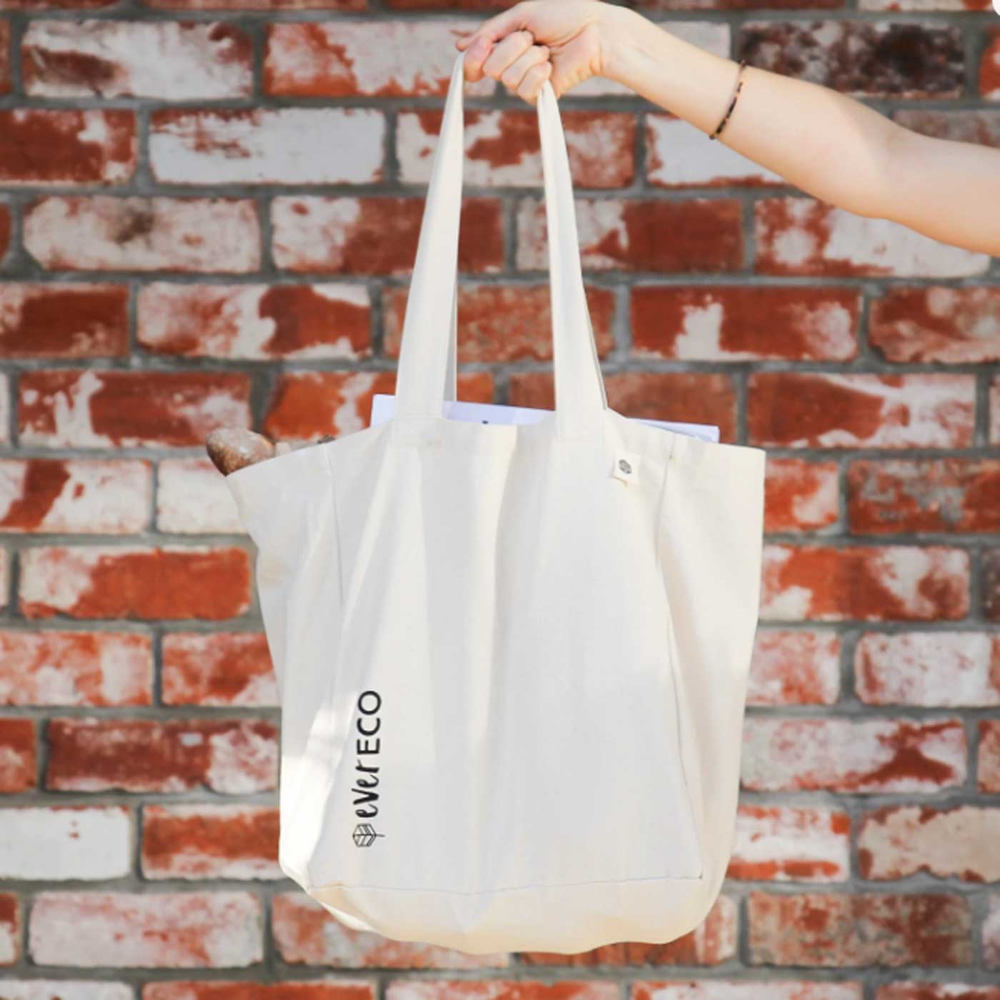 Reusable large cotton and plastic-free tote shopping bag.