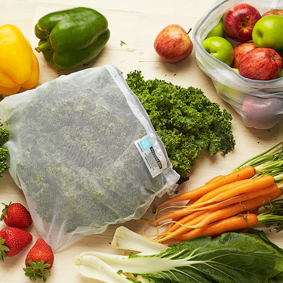 Onya reusable produce bag with kale inside.