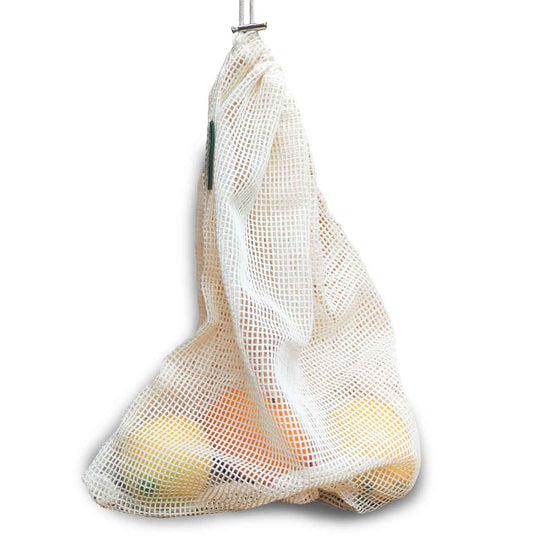 reusable zero waste cotton produce bags with 2 lemons and an orange inside.Diminish.