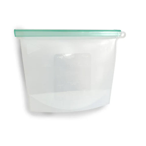 Reusable silicone food pouch with green seal lid. Diminish.