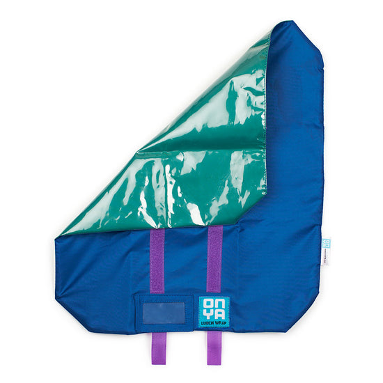 Teal reusable zero waste lunch wrap with corner folded over. Blue on the inside with purple velcro straps. On a white background.