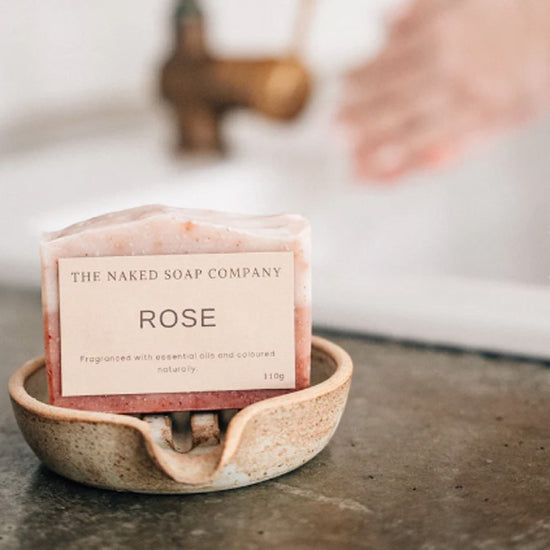 Load image into Gallery viewer, Bar of all natural rose body soap on a soap dish in the kitchen. Plastic-free. Eco shop Adelaide. Diminish.

