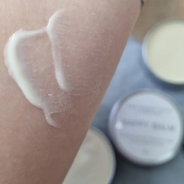 All natural vegan and cruelty free baby balm smothered on someones arm