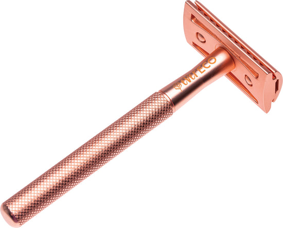 Load image into Gallery viewer, Rose gold plastic free reusable razor on a white background.
