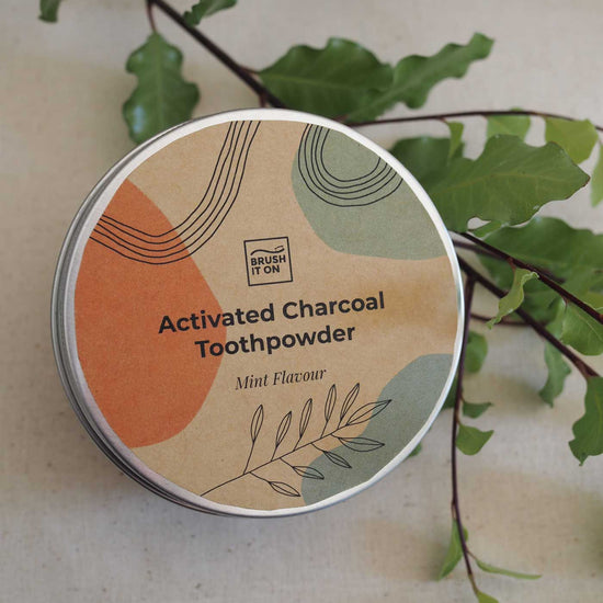 Brush it on activated charcoal toothpowder in a reusable aluminium tub. A plastic-free alternative to toothpaste.