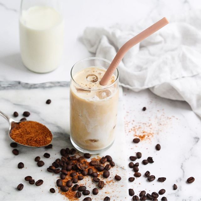 Load image into Gallery viewer, Reusable pastel silicone straw in an iced coffee. Adelaide Eco Shop.
